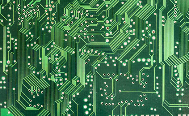 istock Green printed circuit board closeup with lots of electronic pathways, abstract tech simple background texture, computing, electronics PCB design hardware electronic engineering backdrop concept, front 2232852244