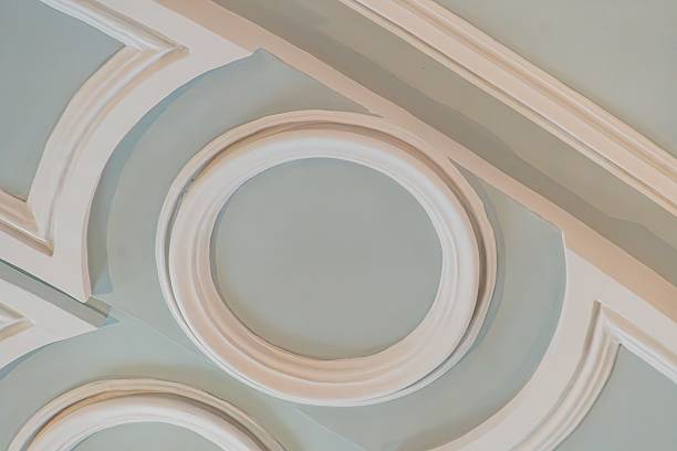 istock Close-up of an elegant, classical ceiling with arches and decorative molding, rendered in light color Wide angle lens or smartphone camera perspective No text present, focusing on architectural bea 2232854884