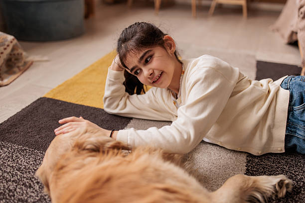 istock Childhood friendship with pet dog 2232857497