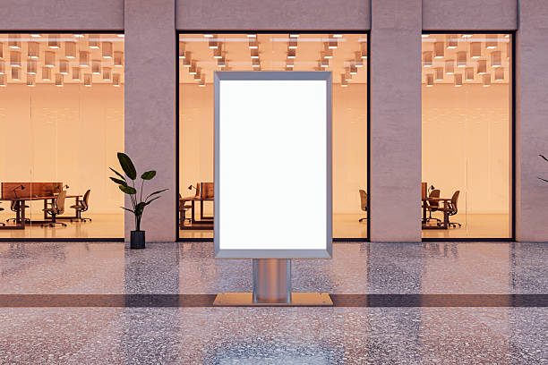 istock Blank vertical billboard mockup in modern office hallway with glass walls, creative lighting and clean corporate workspace in background. 3D Rendering 2232857696