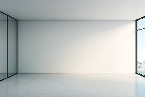 istock Modern minimal empty room interior with glass partition and large window showing city view in soft natural light, ideal for background or mockup. 3D Rendering 2232857747
