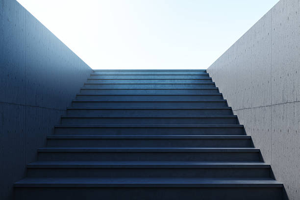 istock Abstract modern staircase leading upward into bright light symbolizing ambition, growth, and future vision in a clean minimalist environment. 3D Rendering 2232857767
