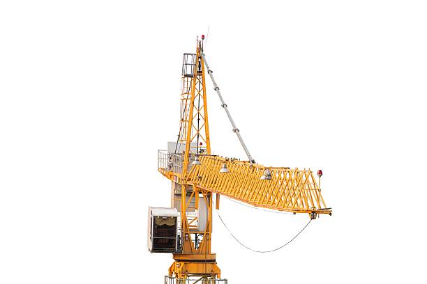 istock Large yellow construction crane on a construction site, with two small figures near its base Overcast day lighting Angled view in a three-dimensional perspective Dominated by the bright yellow of 2232865406