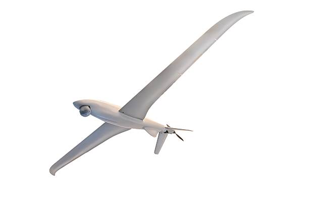 istock Small white glider plane soaring against a clear sky, with black propeller and landing gear, streamlined body, two outward extending wings 2232865523