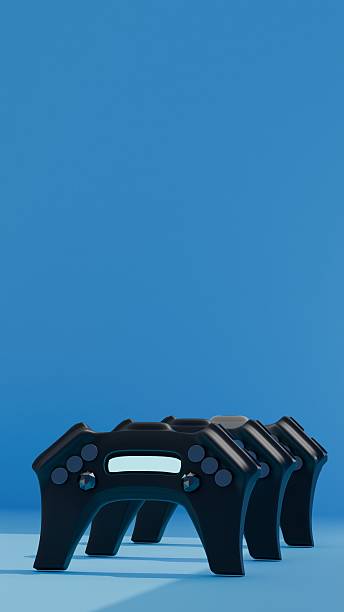 istock Stacked futuristic game controllers placed upright in blue room 2232869930