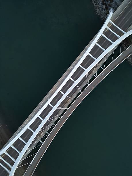istock White bridge against a blue river in drone photography. Edmonton 2232879349