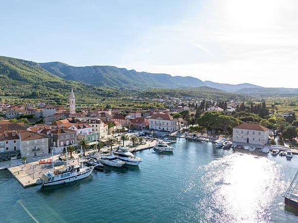istock Coastal Town Harbor with Boats 2232879510