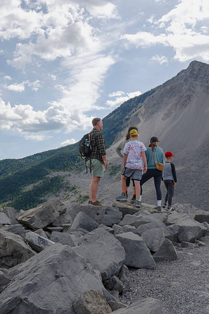 istock Family explore outdoor rock slide museum 2232879880