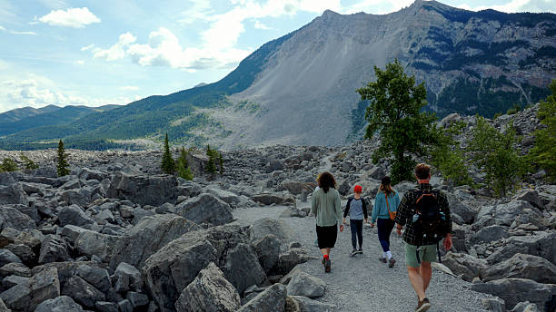istock Family explore outdoor rock slide museum 2232879939
