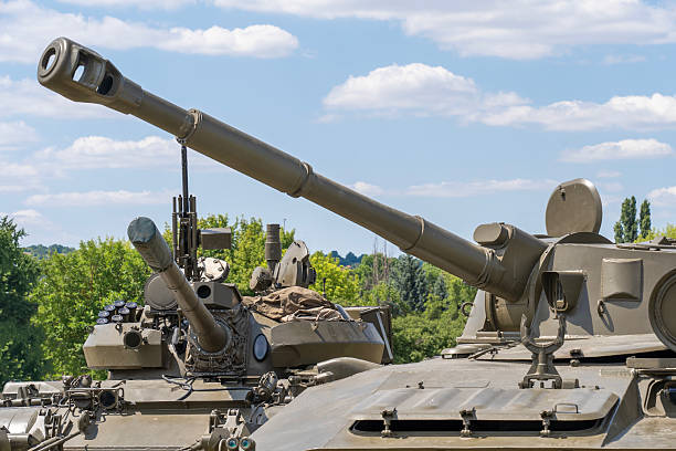 istock Russian self propelled howitzer on tracked chassis in open field 2232886843