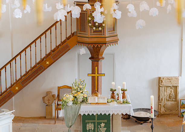 istock Church Altar Decorated with Flowers and Candles 2232906107