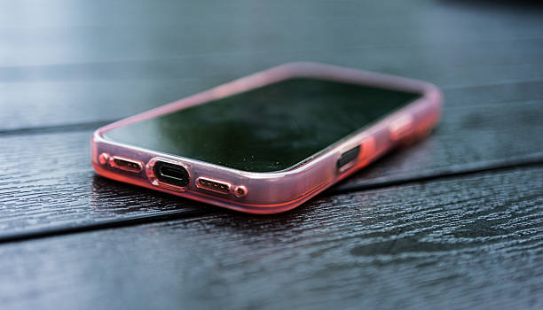 istock Angled smartphone showing charging and speaker ports. 2232906234