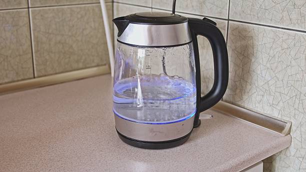 istock Translucent Glass Electric Kettle with Boiling Water 2232920317