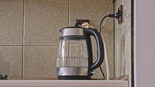 istock Translucent Glass Electric Kettle with Boiling Water 2232920322