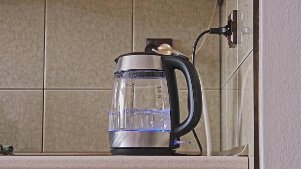 istock Translucent Glass Electric Kettle with Boiling Water 2232920324