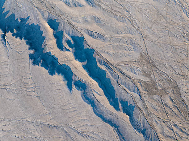 istock Desert Shadows Across Utah Badlands 2232920600
