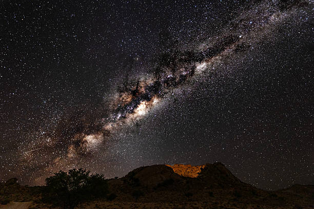 istock rocky hill and milky way 2232922486