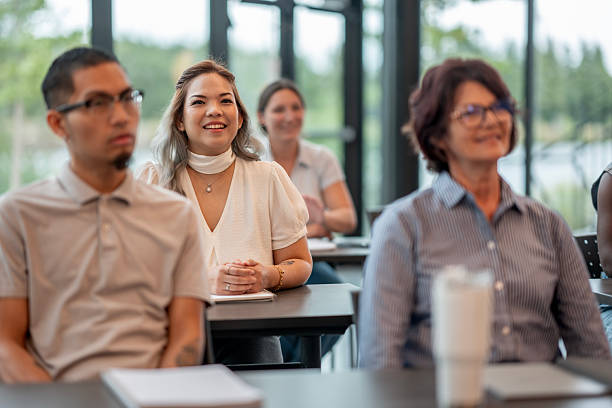 istock Diverse Group of Attendees Engaged in a Professional Training Seminar 2232923313
