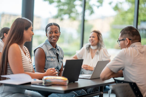 istock Group of Diverse Colleagues Collaborating in a Modern Office Setting 2232923528