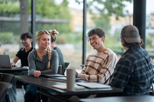 istock Group of Friends Sharing Laughter and Conversation in a Relaxed Setting 2232926688