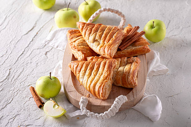 istock Delicious apple triangle cake with cinnamon and crubmle. 2232928895