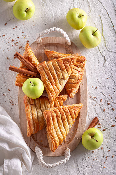 istock Homemade apple triangle cake as a traditional breakfast snack. 2232928906
