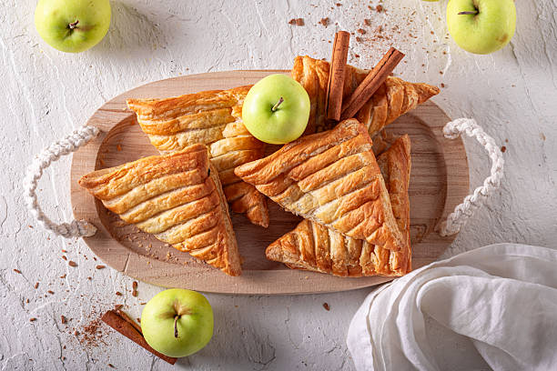 istock Sweet apple triangle cake with cinnamon and crubmle. 2232928927