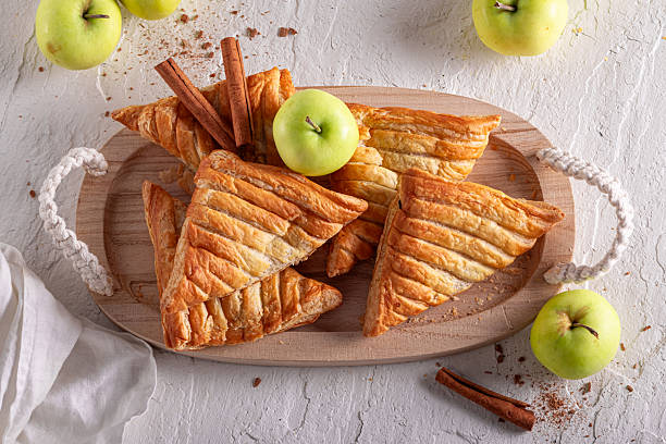 istock Homemade apple triangle cake with cinnamon and crubmle. 2232928928