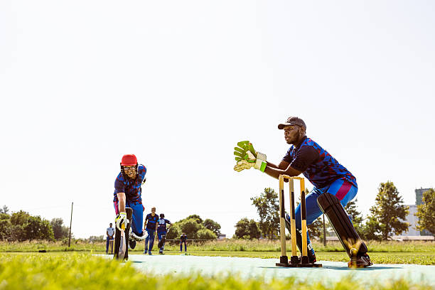 istock Cricket Action on a Sunny Day 2232931188
