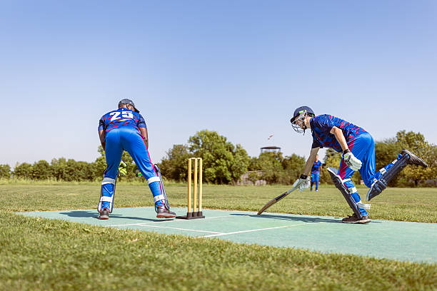 istock Cricket Players in Action on Field 2232931191