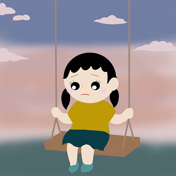 istock Sad-Looking Girl on a Swing in an Evening Park 2232935190