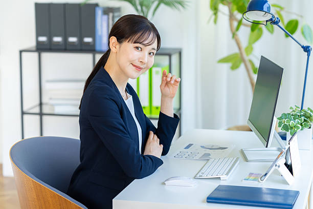 istock business woman working in the office 2232947985