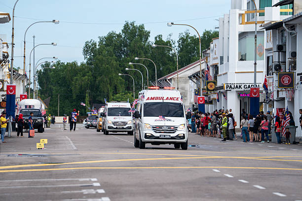Batu Pahat, Johor, Malaysia - August 31, 2025: Multiracial Malaysian people with traditional attire march during 68th Independence Day celebration in Batu Pahat, Malaysia. An editorial image capturing the vibrant Malaysia Independence Day (Hari Kemerdekaan) celebration held in 2025 at Johor, featuring patriotic crowds, national flags (Jalur Gemilang), and traditional cultural performances that reflect the unity and diversity of the Malaysian people.