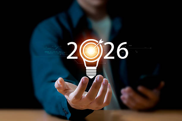 istock Planning and creativity concept. Businessman holding light bulb with target icon and 2026 representing business goal, strategy, vision, new year planning. 2232954252