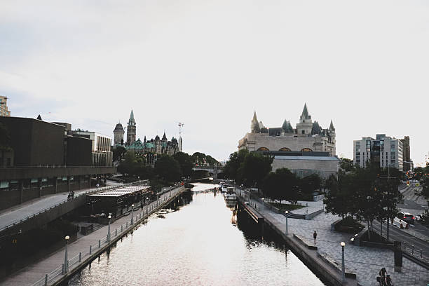 Queen Victoria statue , Parliament Hill and  Parliament buildings. Ottawa, Canada.