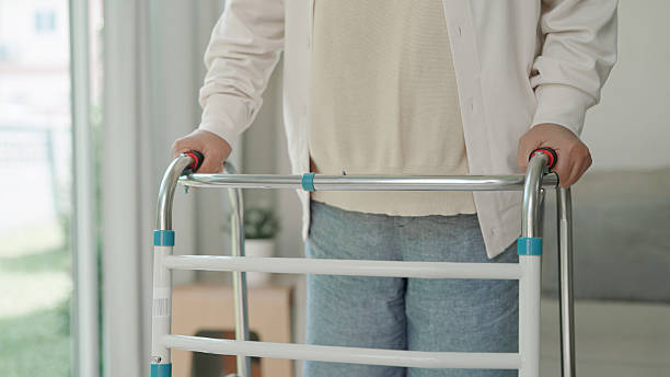 istock Senior women using walker at home 2232955625