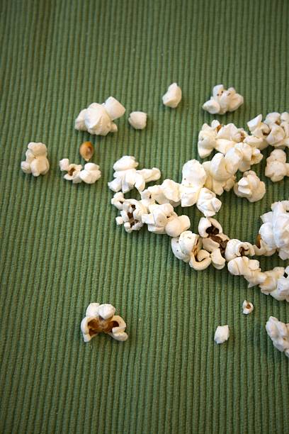 istock Popcorn on green fabric, close up, background 2232960998