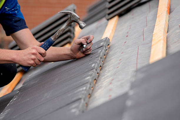 istock Roofer carefully installing roofing materials on newly built residential structure with scaffolds surrounding working area ensuring safety and accessibility 2232961905