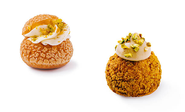 Unique dessert creations featuring cream and pistachios on pastries