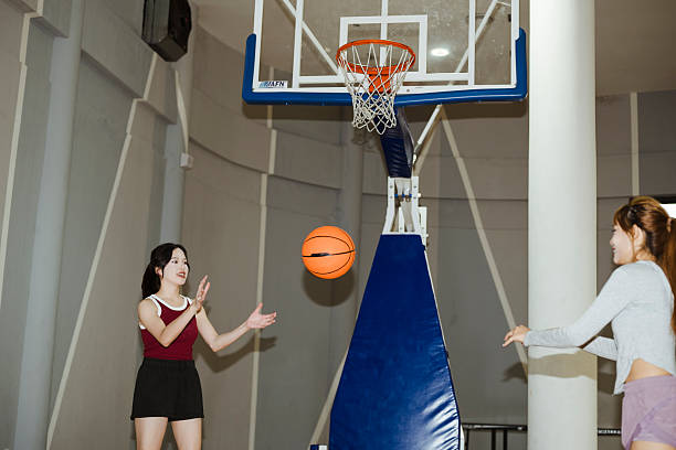 Friends playing basketball