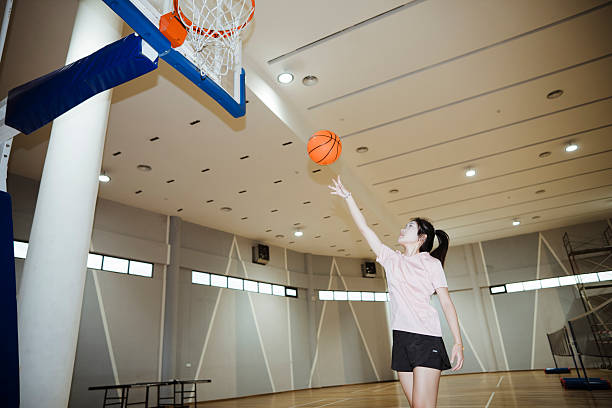 istock Friends playing basketball. 2232967340