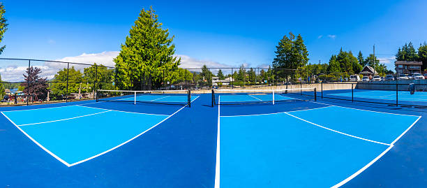 istock Two pickleball courts await players on sunny summer day 2232970568