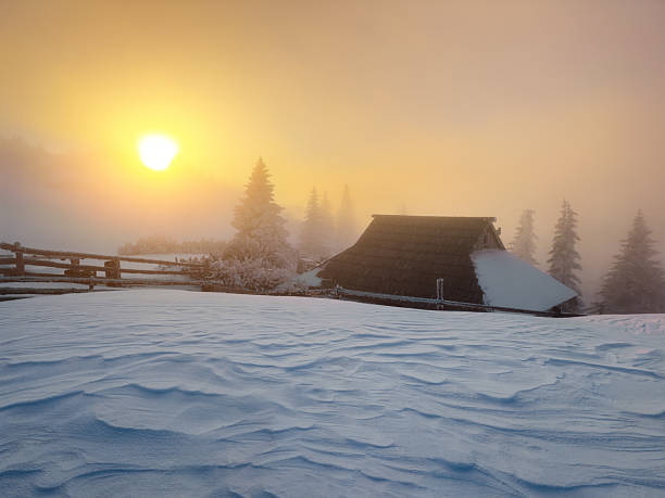 Sunset in mountain village (Velika planina, Slovenia).