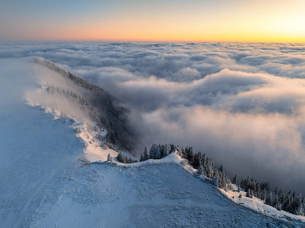 istock Sunset Above The Fog 2232974523