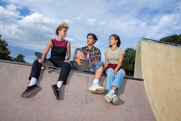 istock Young People Practicing Skateboarding at Skatepark Ramp 2232976127