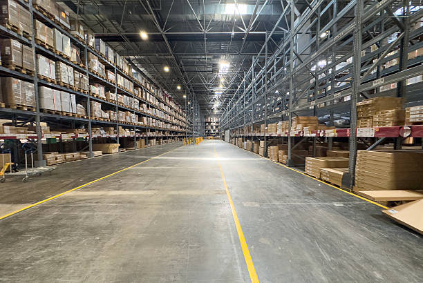 istock Large industrial warehouse with organized shelves and logistics 2232976173