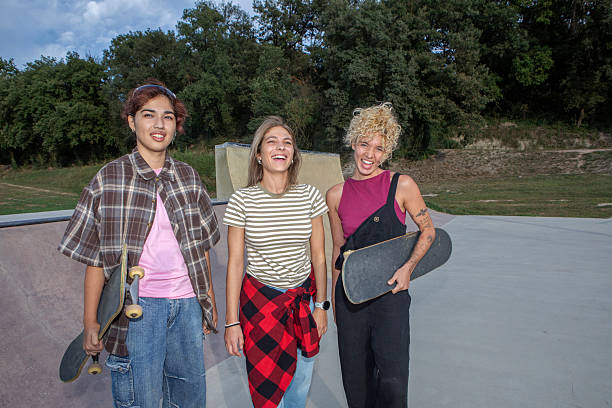 istock Young People Practicing Skateboarding at Skatepark Ramp 2232976317