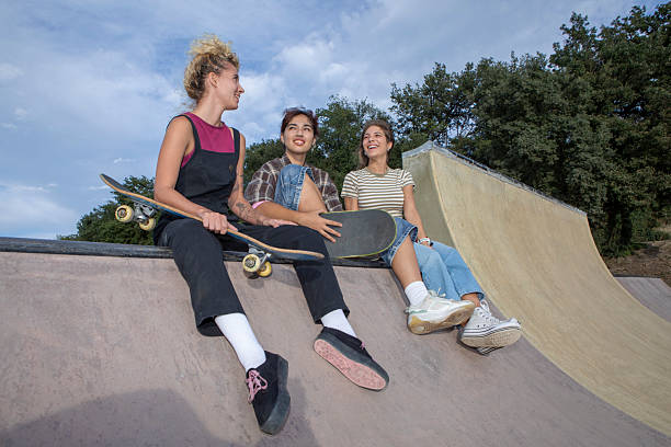 istock Young People Practicing Skateboarding at Skatepark Ramp 2232976318