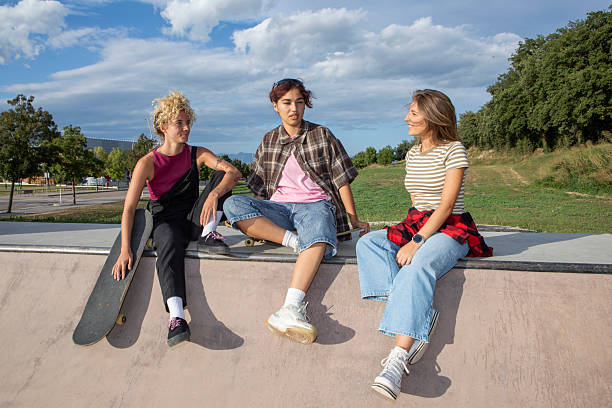 istock Young People Practicing Skateboarding at Skatepark Ramp 2232976477