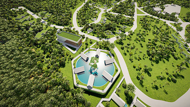 istock Aerial wide angle view 3D Render of a modern residential complex by the beach, featuring villas, glamping sites, tourist resort, bungalows, houses, restaurants, and common spaces, set within a green landscape with roads and white concrete buildings 2232977379